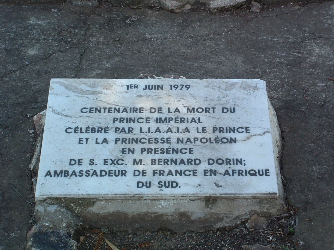 A stone with text on it
AI-generated content may be incorrect.